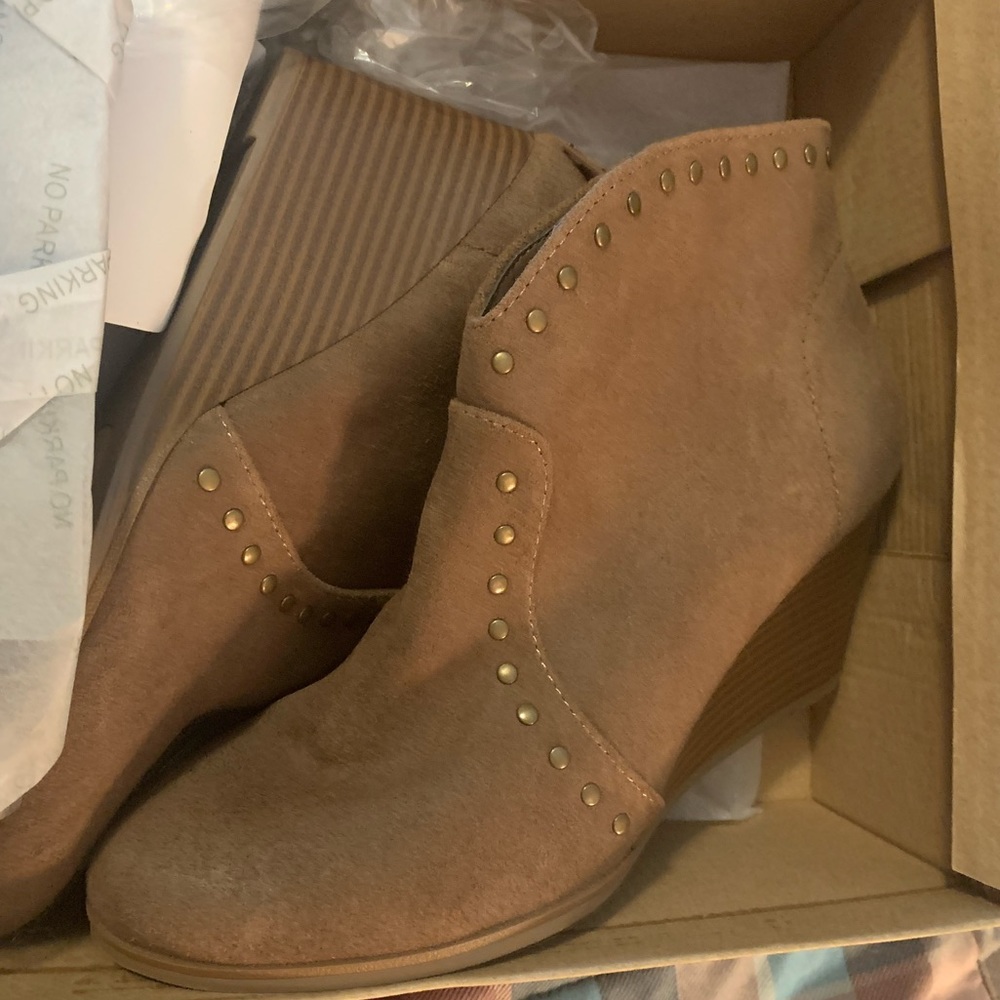 Tan new in box booties.